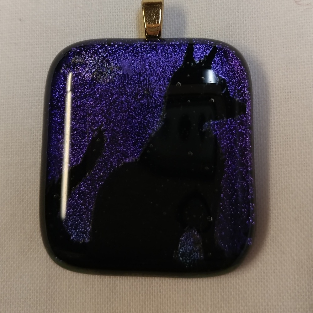 Handmade glass necklace pendant.